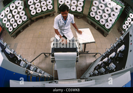 HMA 85351 : man working in textile factory india Stock Photo