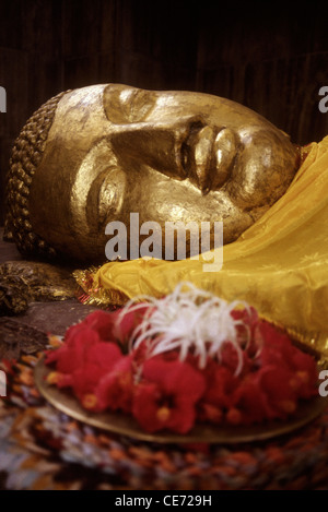 Parinirvana ; Reclining sleeping golden buddha ; mahaparinirvana stupa ; kushinagar ; uttar pradesh ; india ; asia Stock Photo