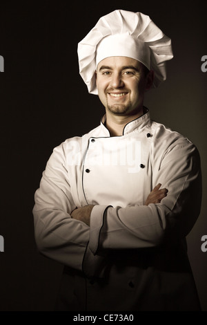 smiling caucasian chef crossed arms Stock Photo