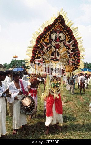 Mask dance ; Padayani ; Padeni ; traditional folk dance and ritual art ; Bhagavati temple ; kerala ; India ; asia Stock Photo