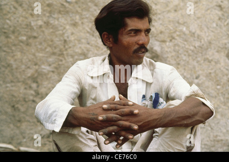 Hexadactyly ; Indian man with six fingers in hands ; congenital malformation ; Polydactyly ; polydactylism ;  hyperdactyly ; India ; Asia Stock Photo