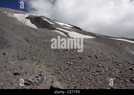 snow field ash outside of crater Mount St Helens Volcano National monument washington Stock Photo