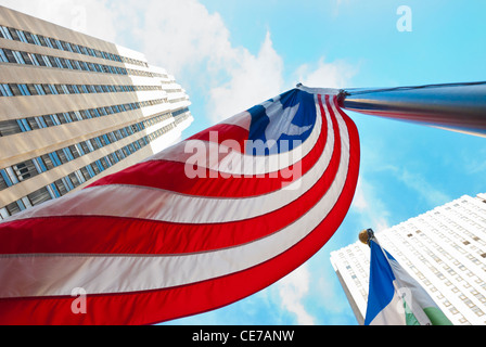 Liberian flag flying to right of 30 Rockefeller Center, GE Building, at Rockefeller Plaza, Manhattan, New York City, USA, 2012 Stock Photo