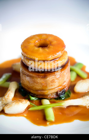 Pot Roast local Welsh Pork with Caramelized Apple and Welsh cider sauce Stock Photo