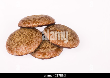 Aromatic ginger cookies with a sugar icing and chocolate coating Stock Photo