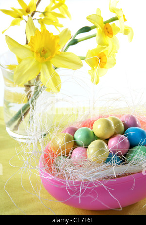 Easter egg filled with chocolate candy eggs. Stock Photo