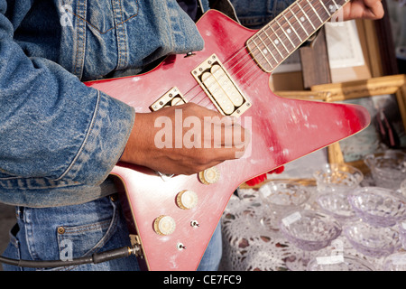 Closeup of man playing electric guitar Stock Photo