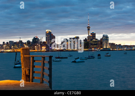 View of Auckland city skyline at dusk from Devonport, Auckland, North Island, New Zealand Stock Photo