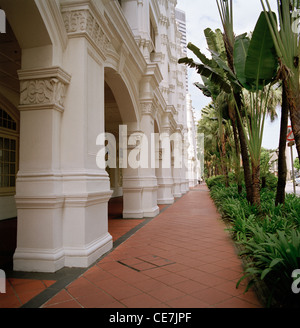 The exclusive luxury Raffles Hotel in Singapore in Far East Southeast Asia. Architecture Building Rich Wealth Wealth Money Upmarket Lifestyle Travel Stock Photo