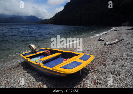 Boat on shore of Lago Paimun, Parque Nacional Lanin, Neuquen, Argentina. No PR Stock Photo