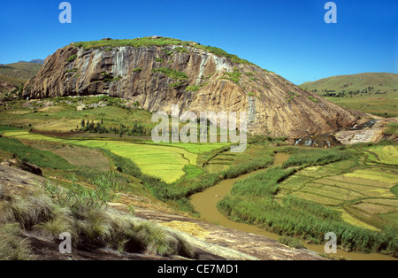 Panoramic Landscape of Granite Inselberg, or Rocky Outcrop Landscape & Rice Paddies near Ambalavao, South Central Madagascar Stock Photo