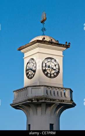 Clock on the Captain Scott memorial lighthouse on Roath Park Lake in Cardiff south Wales Stock Photo