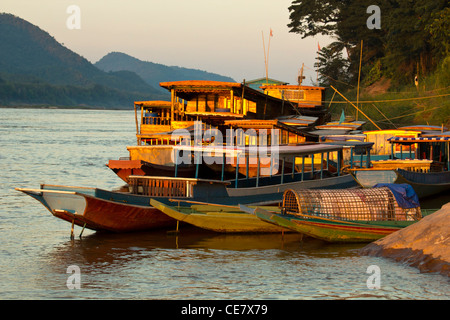Ships anchored on the river bank of mekong river Stock Photo