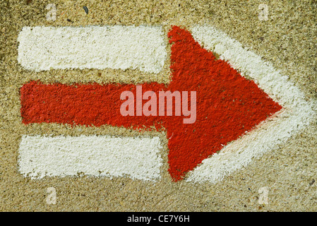 red arrow on a wall Stock Photo