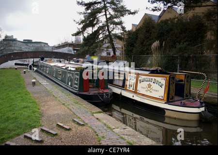 Narrowboats going down Uxbridge Lock, Grand Union Canal, Uxbridge, Hillingdon, London, England Stock Photo