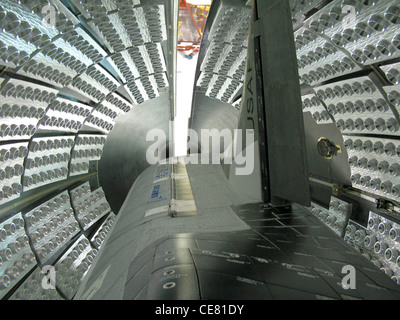 The US Air Force X-37B Orbital Test Vehicle during encapsulation within the United Launch Alliance Atlas V 5-meter fairing Feb. 8, 2011, at Astrotech in Titusville, Fla. The fairing protects and carries the OTV into space. Stock Photo