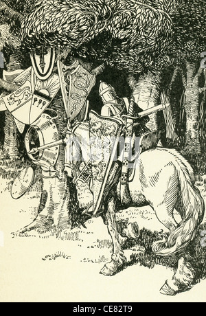 Lancelot hits the bottom of an iron basin at the foot of a tree on which hung the shields of many brother knights. Stock Photo