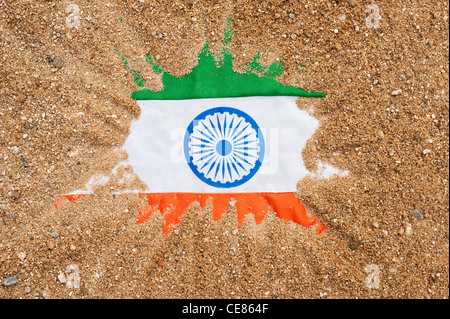 Indian flag showing through sand Stock Photo