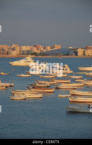 The Mediterranean seascape and skyline of Alexandria with the inner harbor in the foreground. Stock Photo