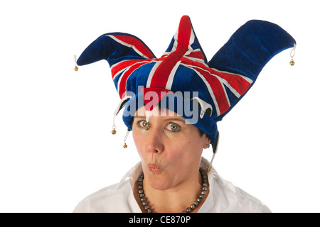 Woman is wearing a funny Brittish hat Stock Photo