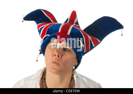 Woman is wearing a funny Brittish hat Stock Photo