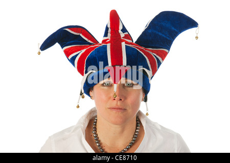 Woman is wearing a funny Brittish hat Stock Photo