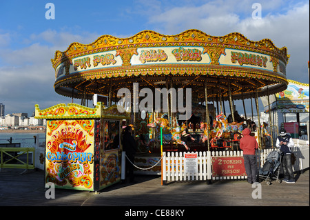 Merry go Round on Brighton Palace Pier. Stock Photo