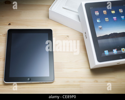 iPad and packaging on a table Stock Photo