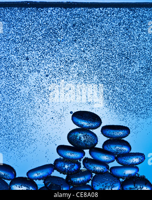 Blue glass pebbles underwater shot with professional medium format digital leaf back. Stock Photo