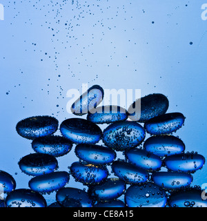 Blue glass pebbles underwater shot with professional medium format digital leaf back. Stock Photo