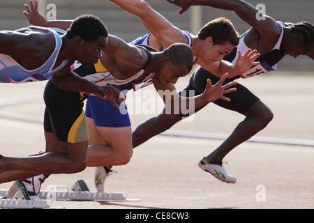 Runners Taking Off From Starting Point Stock Photo