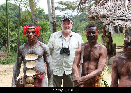 British Traveller visiting a remote village on the Karawari River in  Papua New Guinea Stock Photo