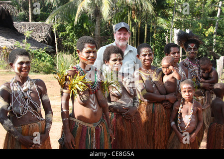 British Traveller visiting a remote village on the Karawari River in  Papua New Guinea Stock Photo