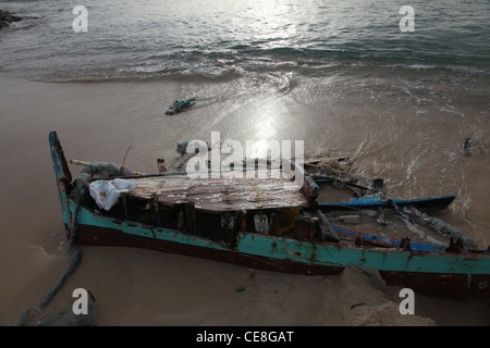 Damaged ship on the beach Stock Photo