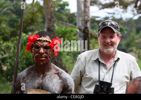 British Traveller visiting a remote village on the Karawari River in  Papua New Guinea Stock Photo