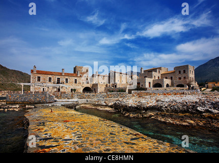 Old warehouses in the small port of Gerolimenas village, in Lakonian Mani, nowadays converted into an atmospheric hotel. Greece Stock Photo