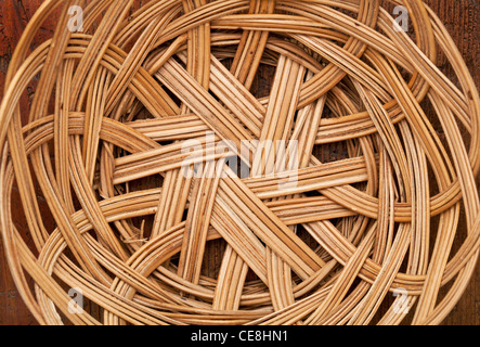 empty wicker basket abstract with circular pattern, focus on a bottom Stock Photo
