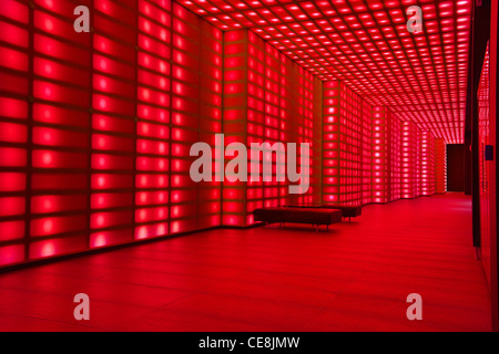 Red lighting wall lobby / entrance room to night club or disco. Stock Photo