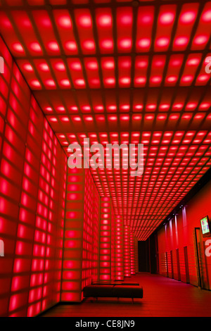 Red lighting wall lobby / entrance room to night club or disco. Stock Photo