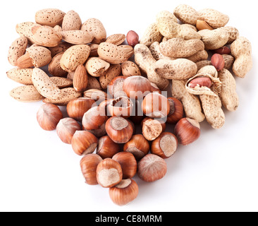 Nuts in the shape of heart isolated on a white background. Stock Photo