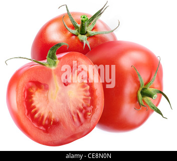 Two tomato with a slice on a white background. Stock Photo