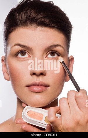 Eyeshadow application Stock Photo