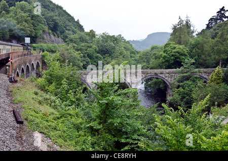 Steam train crossing a viaduct on the Llangollen Railway, North Wales. Stock Photo