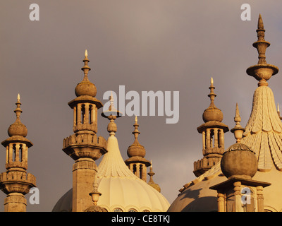 The domes, spires and turrets of Brighton's Royal Pavilion set against a stormy sky. Stock Photo