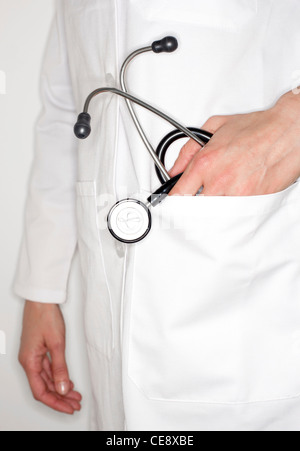 MODEL RELEASED. Stethoscope in a doctor's pocket. Stock Photo