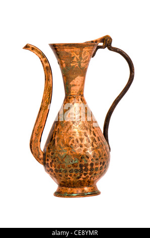 isolated on white and ornamental old copper jug Stock Photo