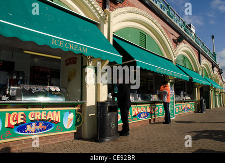 Shops and cafe on Brighton sea front east Sussex UK Stock Photo