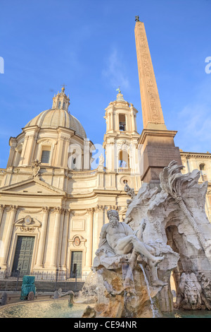 The Four Rivers Fountain - Fountain of the Four Rivers - on the Piazza Navona in Rome, Lazio, Italy. Stock Photo