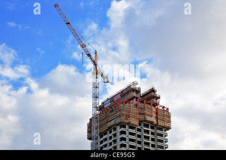 High-rise building, construction site with a crane, Kop van Zuid, Rotterdam, Holland, Netherlands, Europe Stock Photo