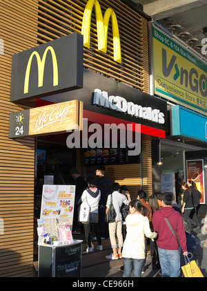 dh McDonalds McCafe TSIM SHA TSUI HONG KONG Chinese teenagers queuing hamburger cafe Kowloon china fast food abroad Stock Photo